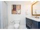 Clean bathroom featuring a marble-top vanity and shower at 3214 Burnette Ne Dr, Roswell, GA 30075