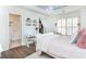 Peaceful bedroom with white sleigh bed and built-in shelves at 3214 Burnette Ne Dr, Roswell, GA 30075