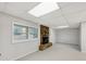 Finished basement with stone fireplace and large windows at 170 Pinehurst Dr, Stockbridge, GA 30281