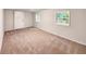 Large finished basement room with neutral carpeting at 170 Pinehurst Dr, Stockbridge, GA 30281