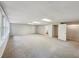 Spacious finished basement with neutral carpeting and large windows at 170 Pinehurst Dr, Stockbridge, GA 30281