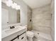 Updated bathroom with a walk-in shower and modern vanity at 170 Pinehurst Dr, Stockbridge, GA 30281