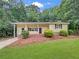 Newly renovated ranch house with a well maintained lawn at 170 Pinehurst Dr, Stockbridge, GA 30281