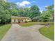 Ranch home with carport and landscaped yard at 170 Pinehurst Dr, Stockbridge, GA 30281