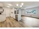 Open concept kitchen with island and dining area at 170 Pinehurst Dr, Stockbridge, GA 30281