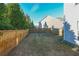 Private backyard with wooden fence and grassy area at 214 Walnut Ridge Rd, Canton, GA 30115