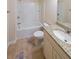 Simple bathroom with granite vanity and bathtub shower combo at 214 Walnut Ridge Rd, Canton, GA 30115