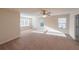 Bright and airy bedroom with neutral carpet and ceiling fan at 214 Walnut Ridge Rd, Canton, GA 30115