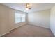 Well lit bedroom with ceiling fan and carpeted floor at 214 Walnut Ridge Rd, Canton, GA 30115
