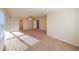 Spacious bedroom with carpeted floor and ceiling fan at 214 Walnut Ridge Rd, Canton, GA 30115