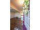 Bright entryway with hardwood floors, and view into living room at 214 Walnut Ridge Rd, Canton, GA 30115