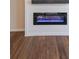 Modern electric fireplace with a white shiplap accent wall at 214 Walnut Ridge Rd, Canton, GA 30115