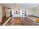 Open concept kitchen with island, stainless steel appliances and hardwood floors at 214 Walnut Ridge Rd, Canton, GA 30115