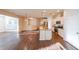 Kitchen with island, stainless steel appliances, and hardwood floors at 214 Walnut Ridge Rd, Canton, GA 30115