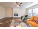 Spacious living room with fireplace and ceiling fan at 214 Walnut Ridge Rd, Canton, GA 30115