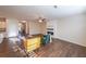 Open concept living room and kitchen with hardwood floors at 214 Walnut Ridge Rd, Canton, GA 30115