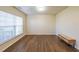 Living room with hardwood floors and large windows at 214 Walnut Ridge Rd, Canton, GA 30115