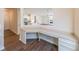 Bright office space with a built-in desk and view into the living room at 214 Walnut Ridge Rd, Canton, GA 30115