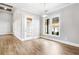 Bright dining room with hardwood floors and access to the outdoors at 607 Walker Ct, Canton, GA 30115