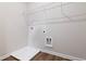 Laundry room with shelving and a utility sink at 730 Brickelberry Court, Marietta, GA 30066