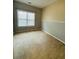 Spacious bedroom with neutral walls and carpet at 4214 Quailbrook Ct, Tucker, GA 30084