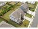 Single-Gathering home with gray roof and landscaped yard at 4259 Hansford Loop, Marietta, GA 30064