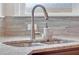 Modern kitchen sink with stainless steel double basin and elegant faucet at 4259 Hansford Loop, Marietta, GA 30064