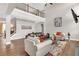 Open living room with hardwood floors, high ceilings, and stylish furniture at 4259 Hansford Loop, Marietta, GA 30064