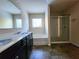 Bathroom boasts double vanity, bathtub and shower at 5150 Amberland Sq, Atlanta, GA 30349