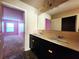 Bathroom with double vanity and a large mirror at 5150 Amberland Sq, Atlanta, GA 30349