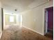 Spacious bedroom with carpeted floors and neutral walls at 5150 Amberland Sq, Atlanta, GA 30349