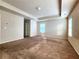 Bright bedroom featuring neutral walls and carpet at 5150 Amberland Sq, Atlanta, GA 30349