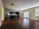 Open kitchen with dark cabinetry, granite counters, and island at 5150 Amberland Sq, Atlanta, GA 30349