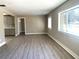 Spacious living room with hardwood floors and neutral walls at 1528 Alder Sw Ln, Atlanta, GA 30311