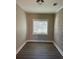 Small office or den with gray walls and hardwood floors at 1528 Alder Sw Ln, Atlanta, GA 30311