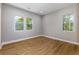 Charming bedroom with neutral walls and hardwood floors at 2036 E Camellia Dr, Decatur, GA 30032