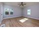 Large bedroom with ceiling fan and hardwood floors at 2036 E Camellia Dr, Decatur, GA 30032