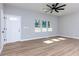 Bright living room with hardwood floors and large windows at 2036 E Camellia Dr, Decatur, GA 30032