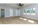 Spacious living room with hardwood floors and multiple doors at 2036 E Camellia Dr, Decatur, GA 30032