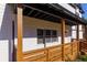 Wooden porch with railing and white brick exterior at 2036 E Camellia Dr, Decatur, GA 30032