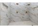 Walk-in shower with marble tile and rainfall shower heads at 2036 E Camellia Dr, Decatur, GA 30032
