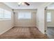 Spacious bedroom with neutral walls, carpet and window with blinds at 3205 Harris Dr, Atlanta, GA 30344