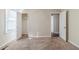 Bright bedroom featuring carpet, closet, and access to other rooms at 3205 Harris Dr, Atlanta, GA 30344
