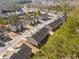 Wide aerial view of townhome community and landscape at 646 Oakside Pl, Acworth, GA 30102