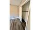 Bedroom closet with double sliding doors and ample hanging space at 1608 Briarcliff Ne Rd # 3, Atlanta, GA 30306