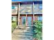 Inviting townhome entry with brick and gray siding at 1608 Briarcliff Ne Rd # 3, Atlanta, GA 30306