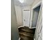 View of a hallway with doors to bedrooms and wood-look flooring at 1608 Briarcliff Ne Rd # 3, Atlanta, GA 30306