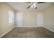 Bedroom with ceiling fan and neutral carpeting at 3388 Jackson Dr, Decatur, GA 30032