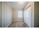 Small bedroom with neutral walls, carpet, and built-in closet at 3388 Jackson Dr, Decatur, GA 30032