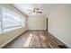 Spacious living room with hardwood floors and ceiling fan at 3388 Jackson Dr, Decatur, GA 30032